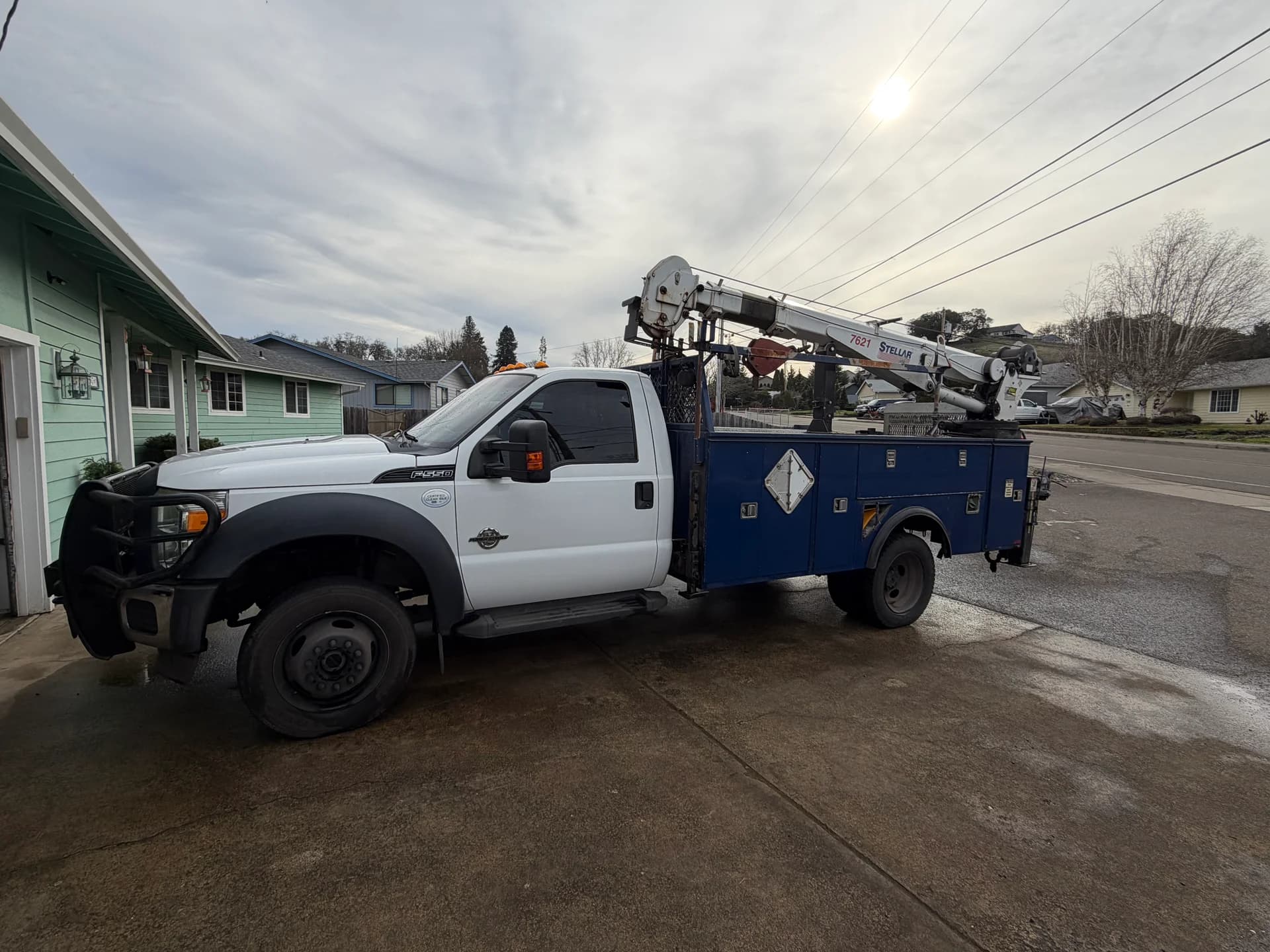 E. Davis Enterprises service truck with crane boom — Southern Oregon utility work